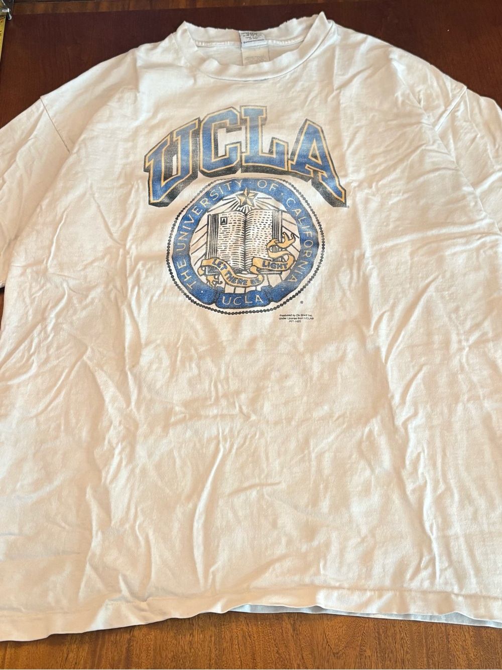 UCLA White Short Sleeve Graphic Tee with Blue Crest